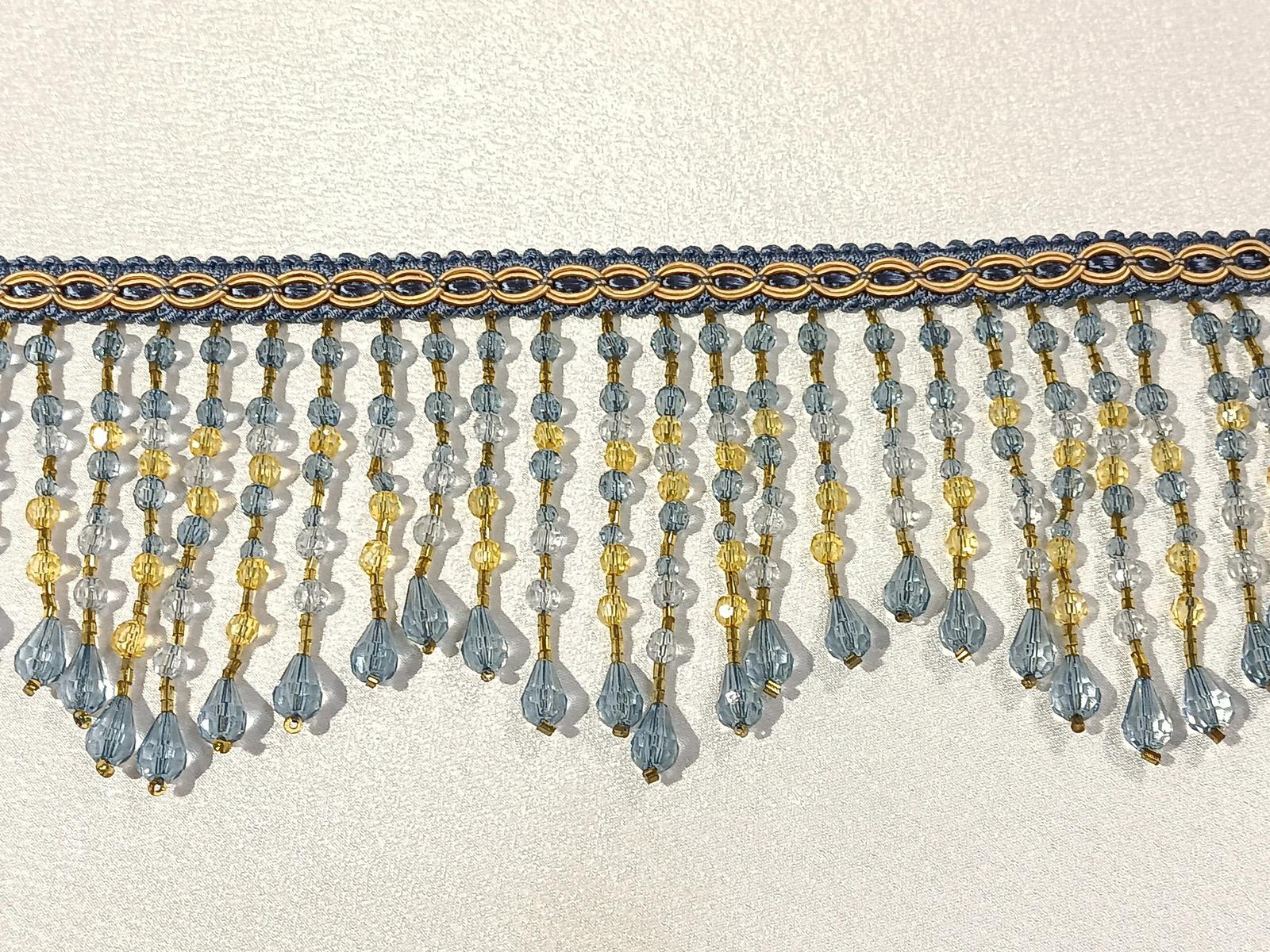 Fleco Rocalla Azul/Oro Picos 9,5 cms