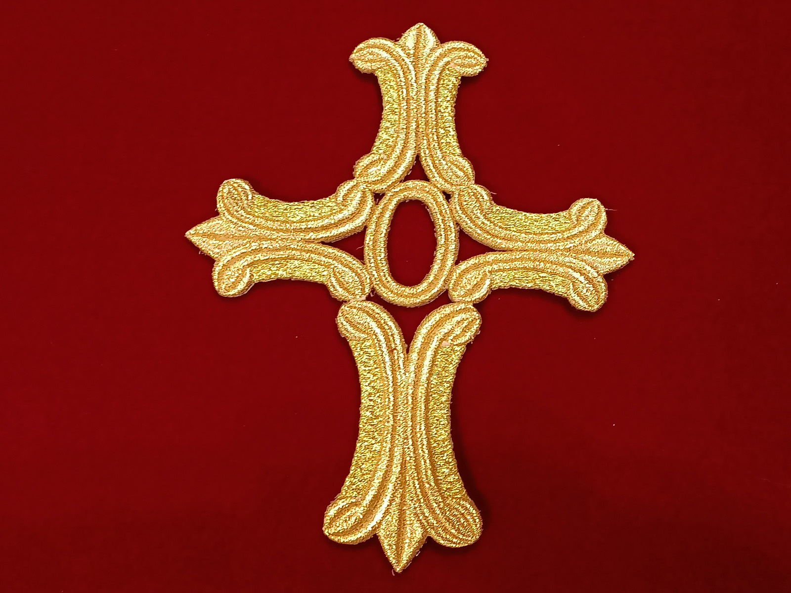 Aplicación Cruz Rey Oro